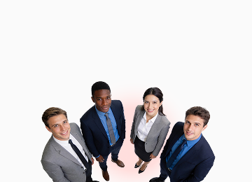 Group of business professionals standing together and looking up